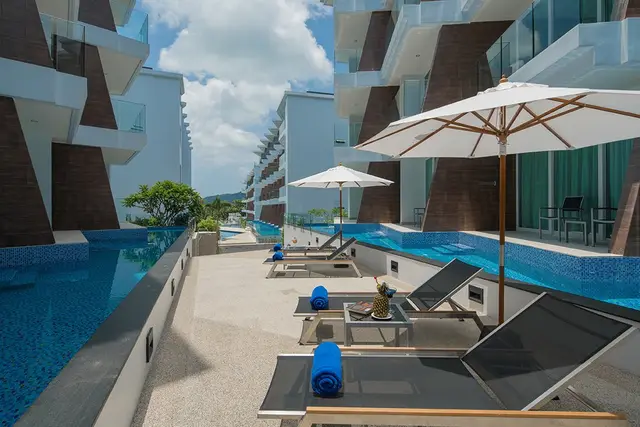 -Bedroom Apartments, with pool view and near the sea in The Beachfront project, on Rawai beach — Rawai